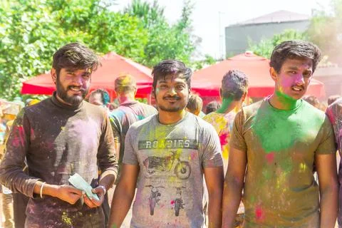 The people in the color fest, colored faces of the peoples Photos