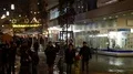 People coming from Christmas market waiting street traffic light Brunswick night 4k or 4k+ Resolution