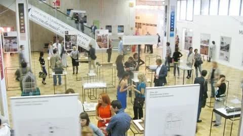 People communicate at exhibition of architecture and design Stock Footage