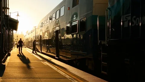 People commuters boarding a train at rush hour going to work or going home HD Stock Footage 105197727