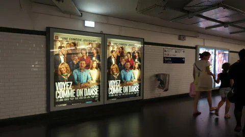 People commuters inside Paris metro station walking from one station to another Stock Footage 149672565