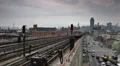 People Commuters Subway Line Passing Queens Neighborhood New York City Skyline HD Footage