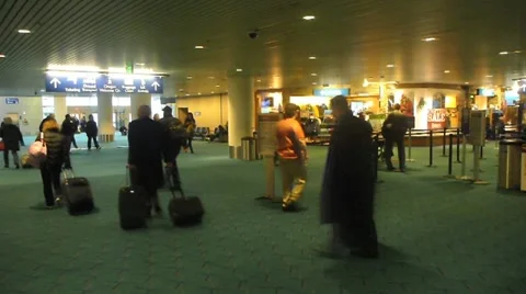 People Commuting in Airport Stock Footage