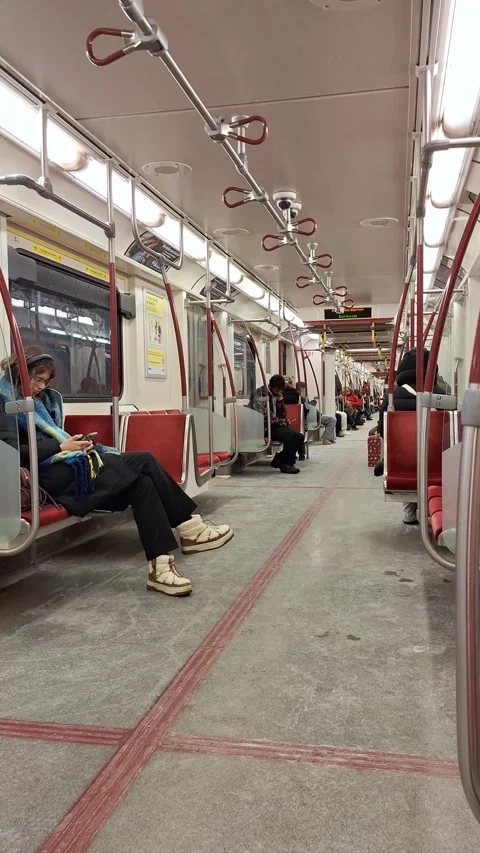 People commuting inside Toronto subway train car Stock Footage 326168439