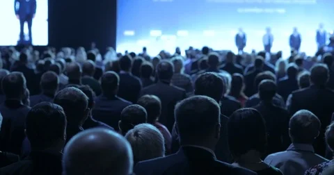 People at a conference or presentation, workshop, master class photograph. Back Stock Footage