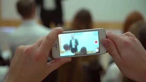 People at a conference or presentation, workshop, picture gadgets make Video stock 85004994