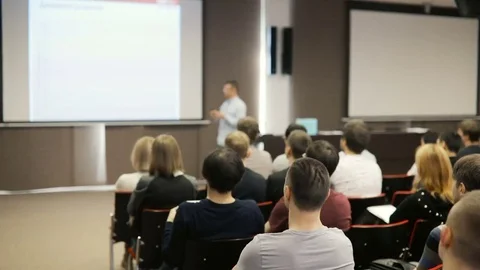 People at a conference or presentation, workshop, master class photograph Stock Footage 85433076