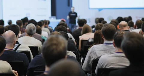 People at a conference or presentation, workshop, master class photograph. Back Stock Footage 87984293