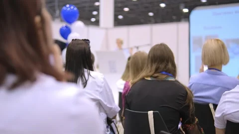 People at a conference or presentation, workshop, master class photograph Stock Footage 248072472