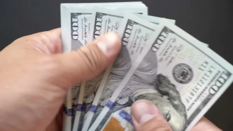 People considers money with his hands a close-up. Dollars in the arm closeup 4k. Stock Footage