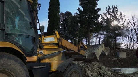 People in construction helmets go on a construction site. Businessmen inspect Stock Footage 125035132