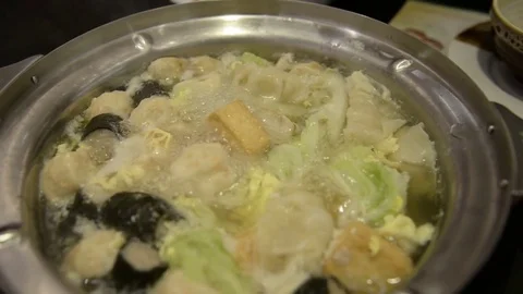 People cooking hot pot Stock Footage 71001978