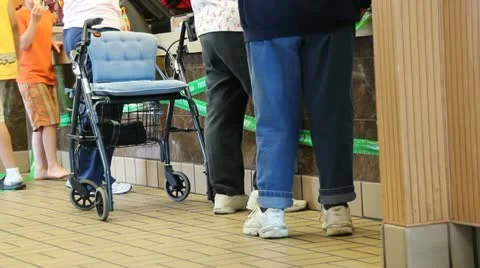 People at a counter 動画素材 10919915