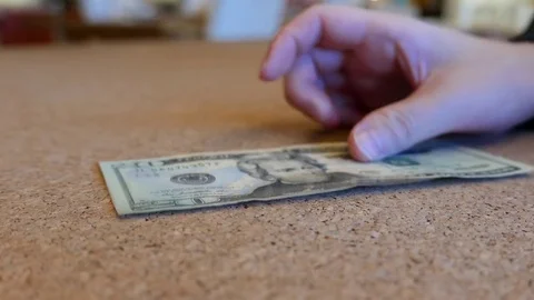 People counting US dollars at a bank counter inside TD bank Stock Footage 70595287