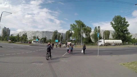 People cross the road at the intersection Stock Footage 131092900