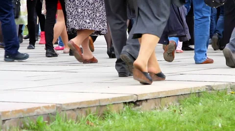 People cross the road at a pedestrian crossing. Stock Footage
