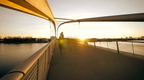 People crossing bridge. time lapse. sunset dusk. motion blur. city urban. Stock Footage 36207557