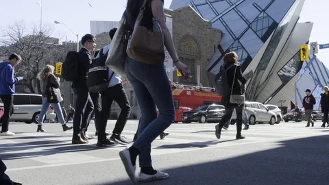 People crossing busy intersection Stock Footage 101812318