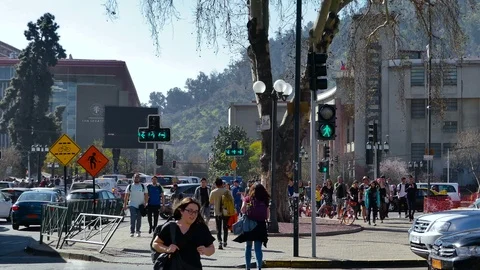 People crossing a dense intersection Stock Footage 97478178