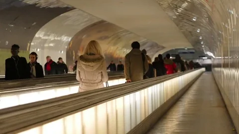 People on crossing Escalators Stock Footage