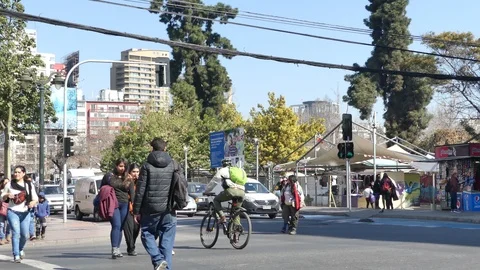 People crossing the intersection Stock Footage 96588909