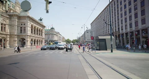 People crossing the Ring Road (Ringstrasse) in Vienna, Austria Stock Footage 251876909