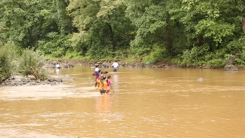 People crossing river Video stock 111805279