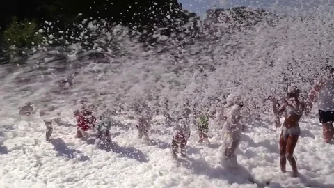 People Crowd Have Fun and Dance at Foam Day Disco Music Party. Stock Footage 77997365