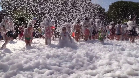 People Crowd Have Fun and Dance at Foam Day Disco Music Party. Stock Footage 77997370