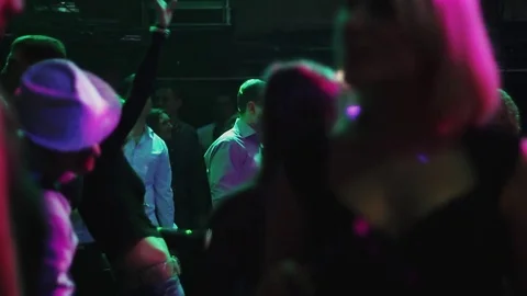 People crowd having fun dancing at night club party dance floor Stock Footage 76556569