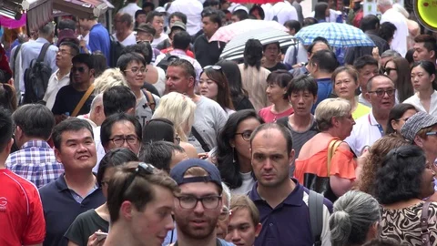 People crowd on streets of Singapore Stock Footage
