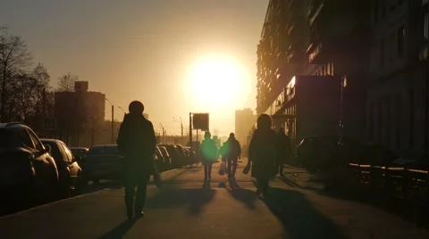 People Crowd Sunset Long Shadows Silhouettes Vídeo Stock 58697010