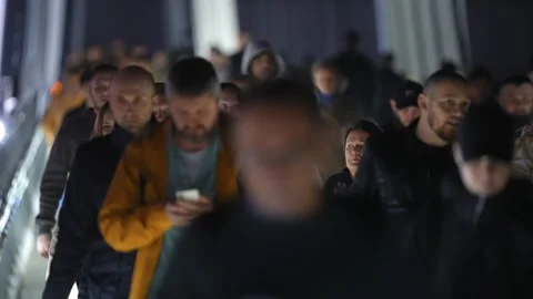 People crowd walking evening city street. Metropolis rush hour. Many pedestrians Stock Footage 303508121