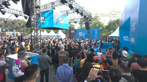 People crowded at the start of a running event Stock Footage 303870827