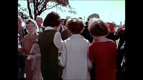 People cry after they hear about President John Kennedy's death - 1963 Stock Footage 89353020
