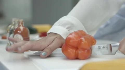 People cutting a pepper 스톡 동영상 75165146