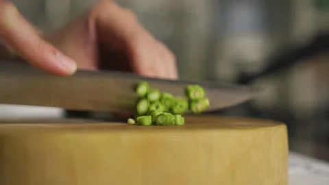 People cutting Yard long beans on wooden cutting board Stock Footage 147745443