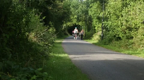 People Cycling on Cycle Path Stock Footage 67261029