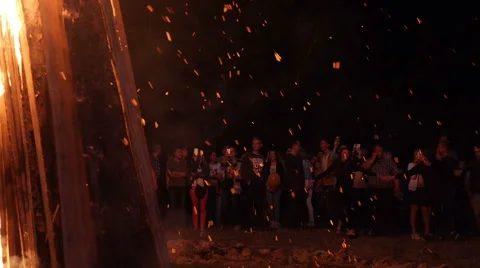 People dance around the fire Stock Footage 64955473