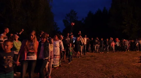 People dance around the fire Stock Footage 64955806