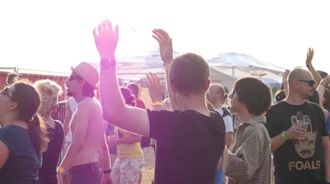 People dance clapping hands enjoying music open air concert festival Stock Footage
