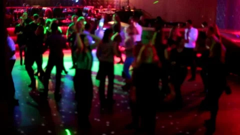 People dance have fun and relax in the nightclub blurred background Stock Footage 88714094