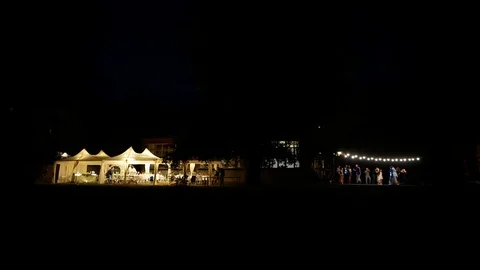 People dance on a summer night.  Stock-Footage 119976123