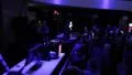 People dancing actively, applauding to DJ playing music at club HD Footage