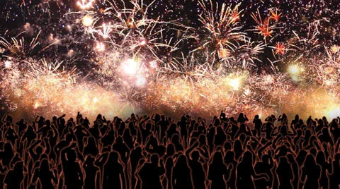 People dancing and fireworks exploding over them. Dolly. Video stock 27094758