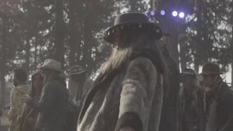 People dancing and having fun at outdoor music festival Stock Footage 122380401