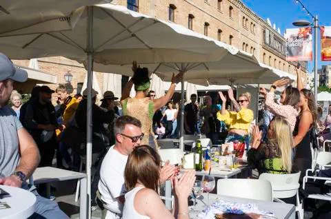 People dancing and having fun at a cafe Stock Photos