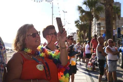 People dancing and having fun at the Gay Pride Parade in Benidorm Stock Photos