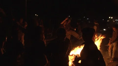 People dancing around a fire Stock Footage 87619968