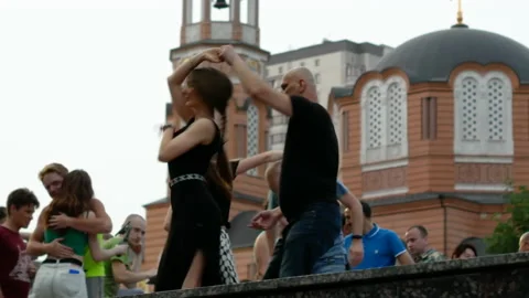 People dancing on the background of the temple Stock Footage 156320484